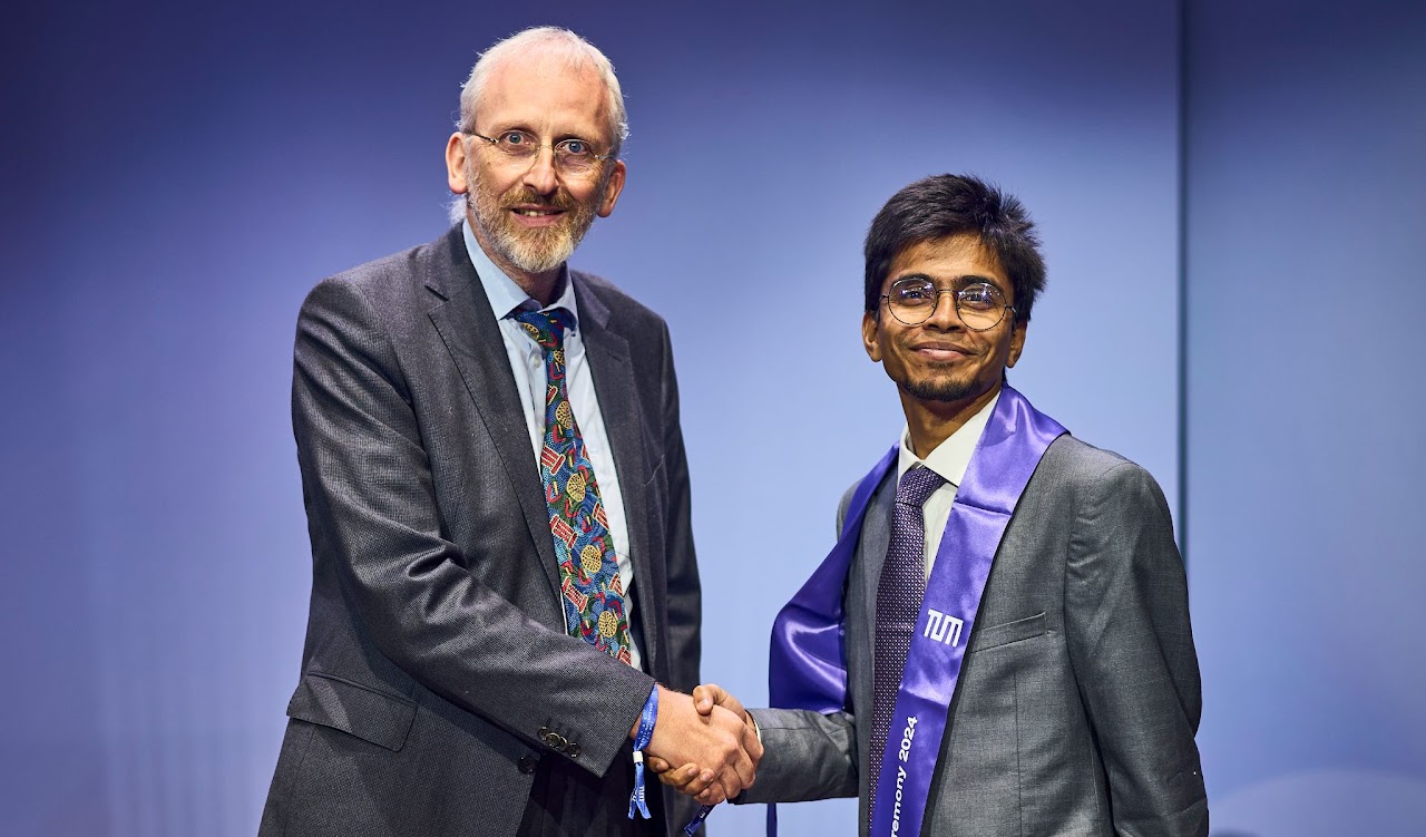 Sourav Sinha at TUM graduation with professor